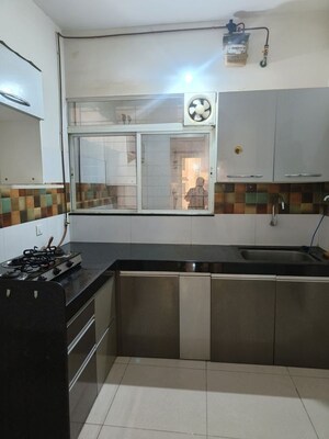 Kitchen in 2 BHK Apartment at Vilas Javdekar Prudentia Towers, Wakad – for Sale