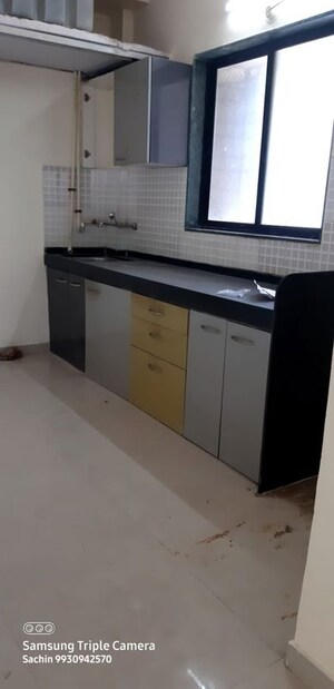 Kitchen in 2 BHK Apartment at Bhanushanti Complex, Malad East – for Rent