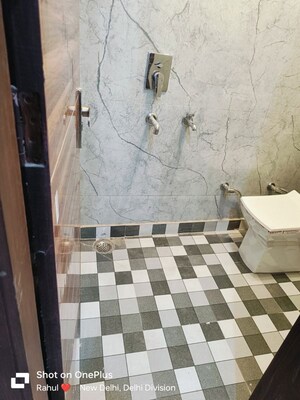 Bathroom in 4 BHK Builder Floor at Dwarka Mor – for Rent