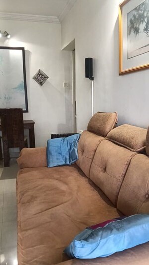 Living Room in 1.5 BHK Apartment at Swapnalok Towers, Malad East – for Rent