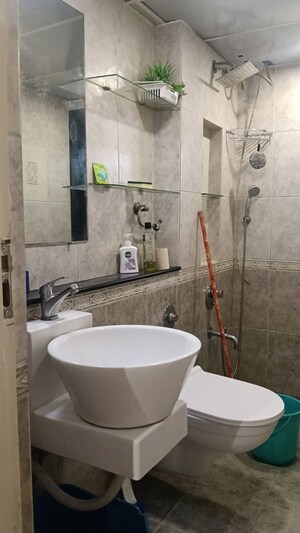 Bathroom in 1.5 BHK Apartment at Swapnalok Towers, Malad East – for Rent