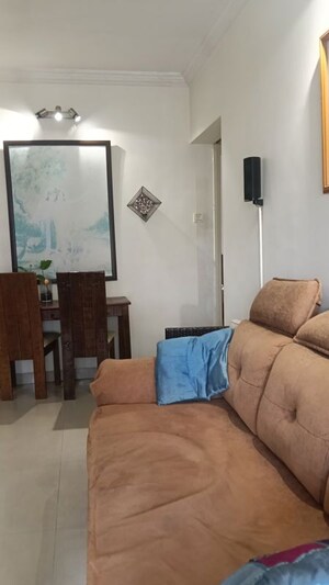 Living Room in 1.5 BHK Apartment at Swapnalok Towers, Malad East – for Rent