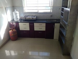 Kitchen in 1 BHK Apartment at Shroff Signature Heights, Wakad – for Rent