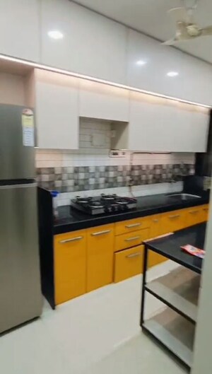 Kitchen in 2 BHK Apartment at Andheri CHS, Andheri West – for Rent