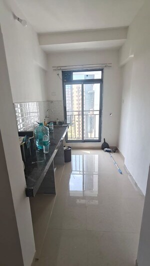 Kitchen in 1 BHK Apartment at Shivam Gulmohar, Goregaon West – for Sale