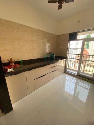 Kitchen in 1 BHK Apartment at Raunak Heights, Ghodbunder Road – for Rent