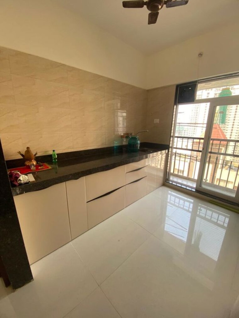 Kitchen, raunak-heights 1 Bedroom 450 Sq.Ft. Apartment In Ghodbunder Road Thane 10727495