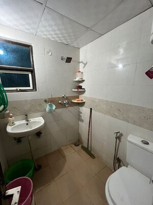 Bathroom in 2 BHK Apartment at KM Residency, Raj Nagar Extension – for Sale