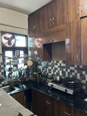 Kitchen in 2 BHK Apartment at KM Residency, Raj Nagar Extension – for Sale