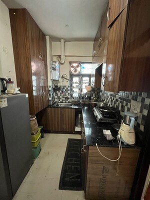 Kitchen in 2 BHK Apartment at KM Residency, Raj Nagar Extension – for Sale