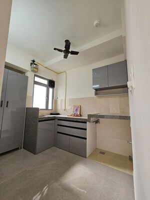 Kitchen in 1 BHK Apartment at Raunak Heights, Ghodbunder Road – for Rent