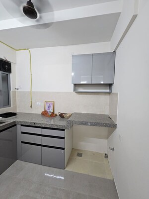 Kitchen in 1 BHK Apartment at Raunak Heights, Ghodbunder Road – for Rent