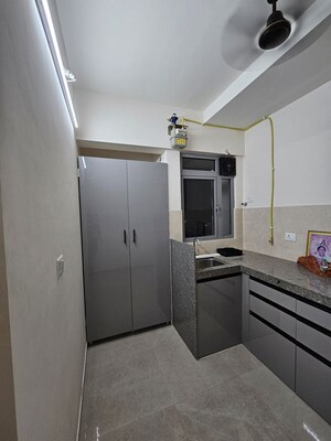 Kitchen in 1 BHK Apartment at Raunak Heights, Ghodbunder Road – for Rent