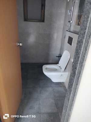 Bathroom in 3 BHK Apartment at Naman Habitat, Andheri West – for Sale