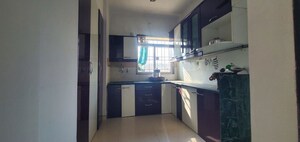 Kitchen in 2 BHK Apartment at Swastik Residency 1, Ghodbunder Road – for Rent