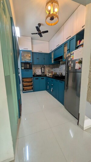 Kitchen in 2 BHK Apartment at Abhinav The One, Bhugaon – for Rent