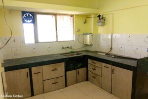 Kitchen in 2 BHK Apartment at Karan Gharonda, Wadgaon Sheri – for Rent
