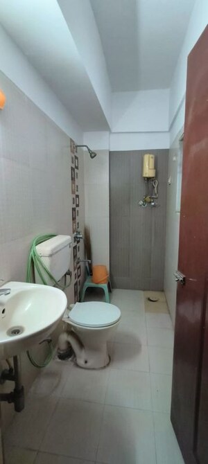 Bathroom in 3 BHK Apartment at Mayuresh CHS, Naupada – for Sale
