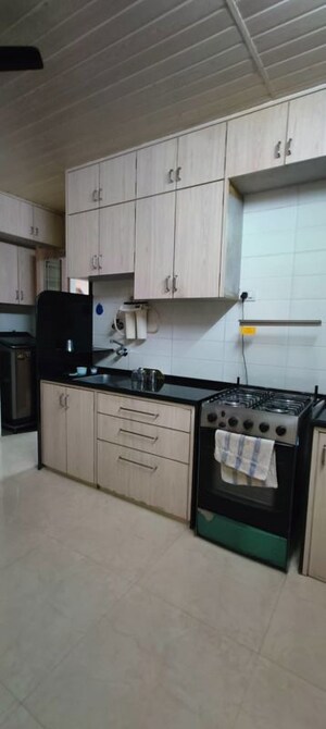 Kitchen in 3 BHK Apartment at Mayuresh CHS, Naupada – for Sale