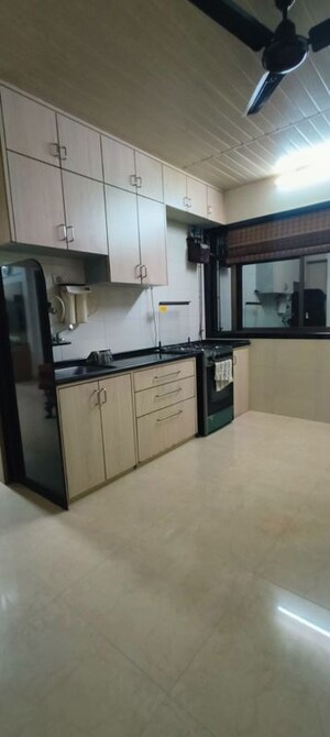 Kitchen in 3 BHK Apartment at Mayuresh CHS, Naupada – for Sale