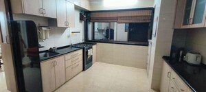 Kitchen in 3 BHK Apartment at Mayuresh CHS, Naupada – for Sale