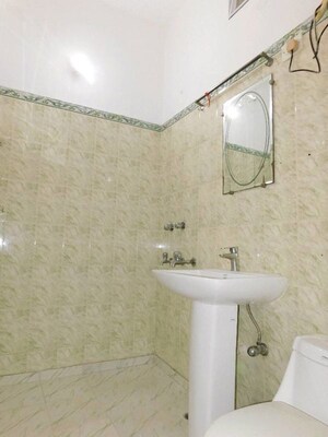 Bathroom in 4 BHK Builder Floor at Chattarpur – for Rent
