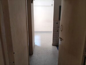 Building Lobby in 1 BHK Apartment at Air India Colony, Nerul – for Rent