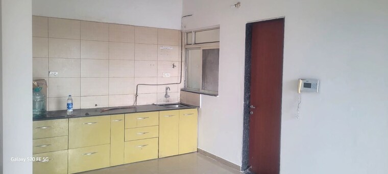 Kitchen, kolte-patil-life-republic 2 Bedroom 801 Sq.Ft. Apartment In Hinjewadi Pune 10728135