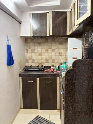 Kitchen in 1 BHK Apartment at Royal Palms, Goregaon East – for Rent