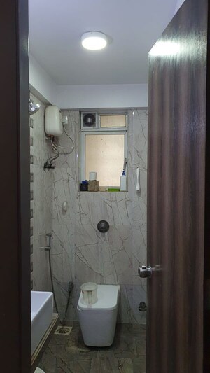 Bathroom in 2 BHK Apartment at DLH Orchid, Andheri West – for Sale