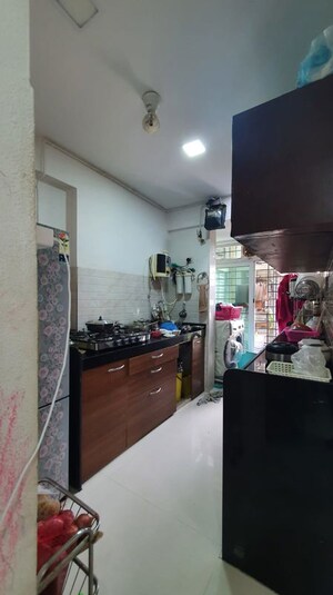 Kitchen in 2 BHK Apartment at DLH Orchid, Andheri West – for Sale
