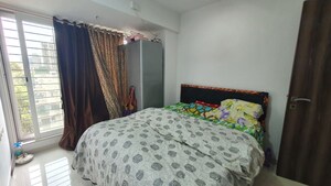 Bedroom in 2 BHK Apartment at DLH Orchid, Andheri West – for Sale