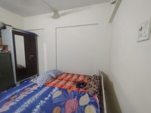 Bedroom in 2 BHK Apartment at Khushboo Exotica, Pimple Gurav – for Rent