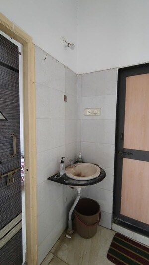 Bathroom in 2 BHK Builder Floor at Rahul Apartments Wadgaon Sheri, Wadgaon Sheri – for Rent