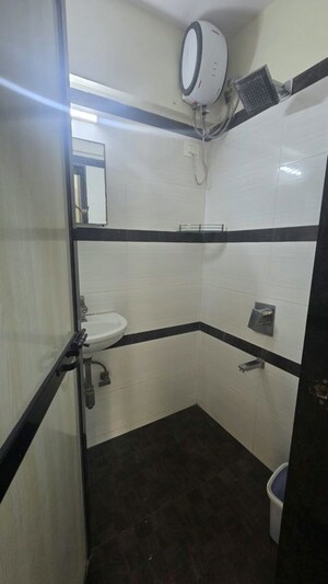 Bathroom in 2 BHK Apartment at Dheeraj Ganga, Malad West – for Rent