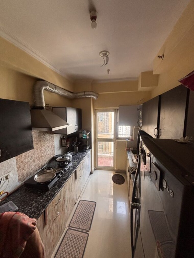 Kitchen, gardenia-golf-city 2.5 Bedroom 1185 Sq.Ft. Apartment In Sector 75 Noida 10728566