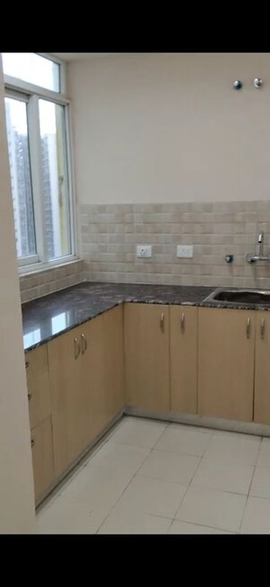 Kitchen in 2.5 BHK Apartment at Amrapali O2 Valley, Tech Zone 4 Greater Noida – for Rent