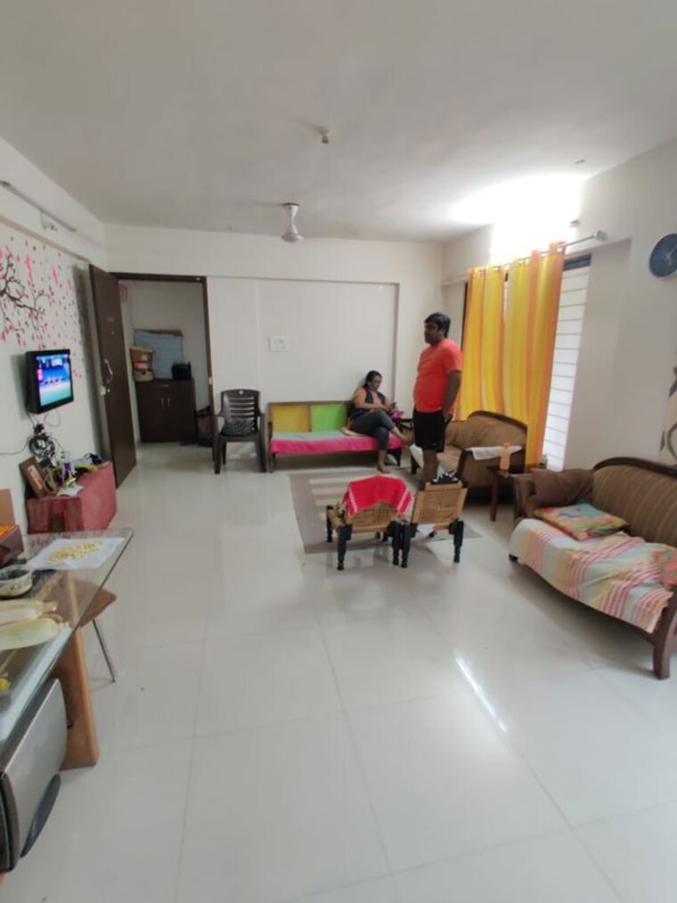 Living Room, abhinav-pebbles-urbania 2 Bedroom 609 Sq.Ft. Apartment In Bavdhan Pune 10728623