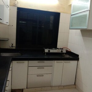 Kitchen in 1 BHK Apartment at Green Fields Apartment, Andheri East – for Rent