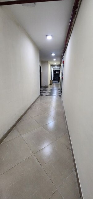 Building Lobby in 2.5 BHK Apartment at AVJ Heights, Zeta I Greater Noida – for Rent