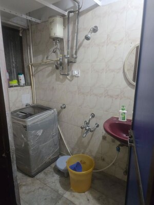 Bathroom in 1 BHK Apartment at Takshila CHS, Andheri East – for Rent