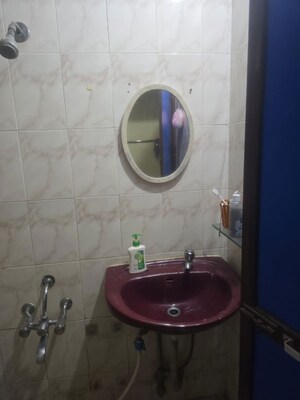 Bathroom in 1 BHK Apartment at Takshila CHS, Andheri East – for Rent