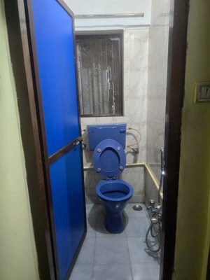 Bathroom in 1 BHK Apartment at Takshila CHS, Andheri East – for Rent