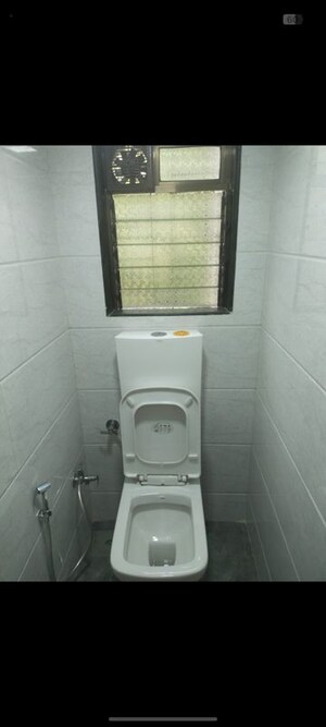 Bathroom in 2 BHK Apartment at Varsha Apartment Vile Parle, Vile Parle West – for Rent