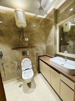 Bathroom in 4 BHK Apartment at Chattarpur – for Rent