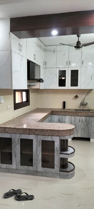 Kitchen in 3 BHK Apartment at SRS Royal Hills, Sector 87 – for Rent