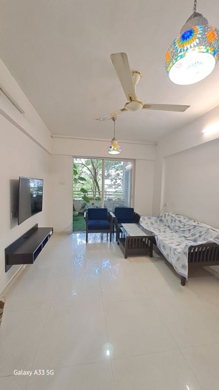 Living Room, vasudha-parnika 2 Bedroom 815 Sq.Ft. Apartment In Balewadi Pune 10728728