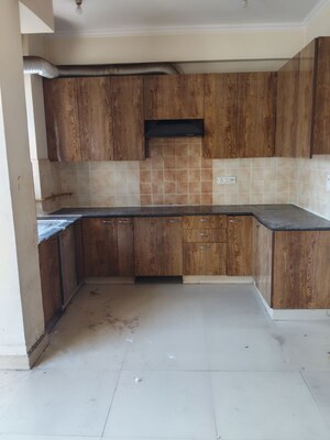 Kitchen in 3 BHK Apartment at Aims Golf City, Sector 75 – for Rent