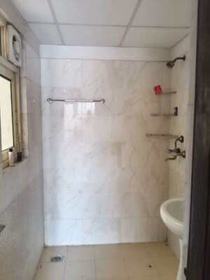 Bathroom in 3 BHK Apartment at Aims Golf City, Sector 75 – for Rent