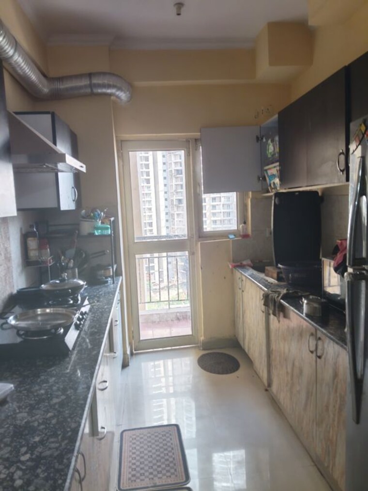 Kitchen, aims-golf-city 2.5 Bedroom 1150 Sq.Ft. Apartment In Sector 75 Noida 10728762
